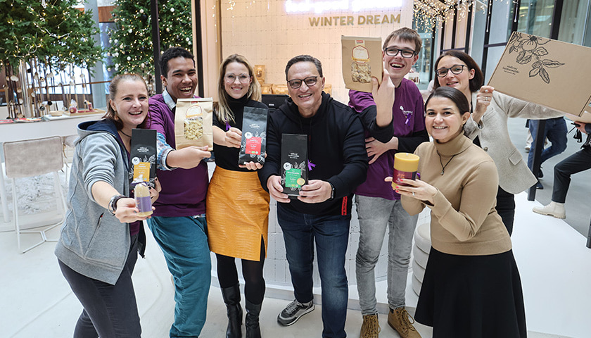 A small group of people with various products on the International Day of Persons with Disabilities (photo)
