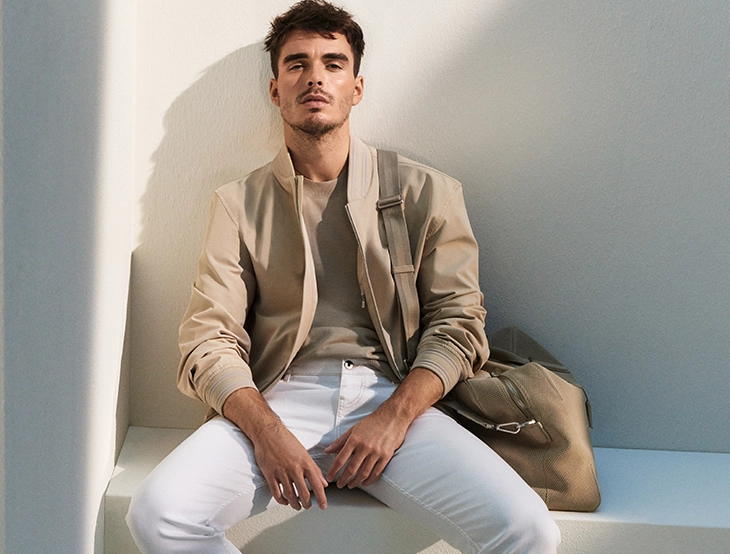 Portrait of Corey Mylchrees in beige outfit (photo)